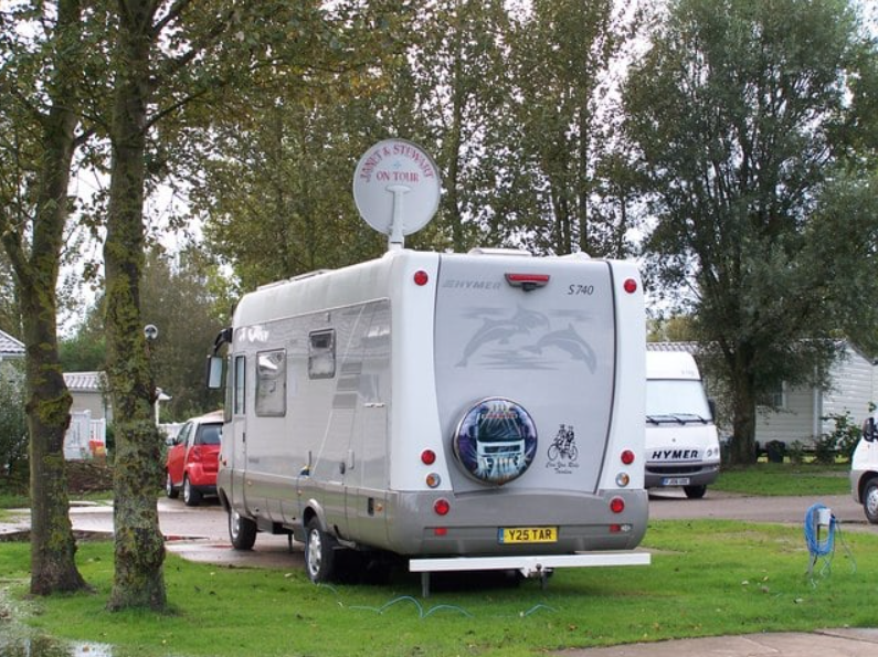 satellite dish on top of the RV 