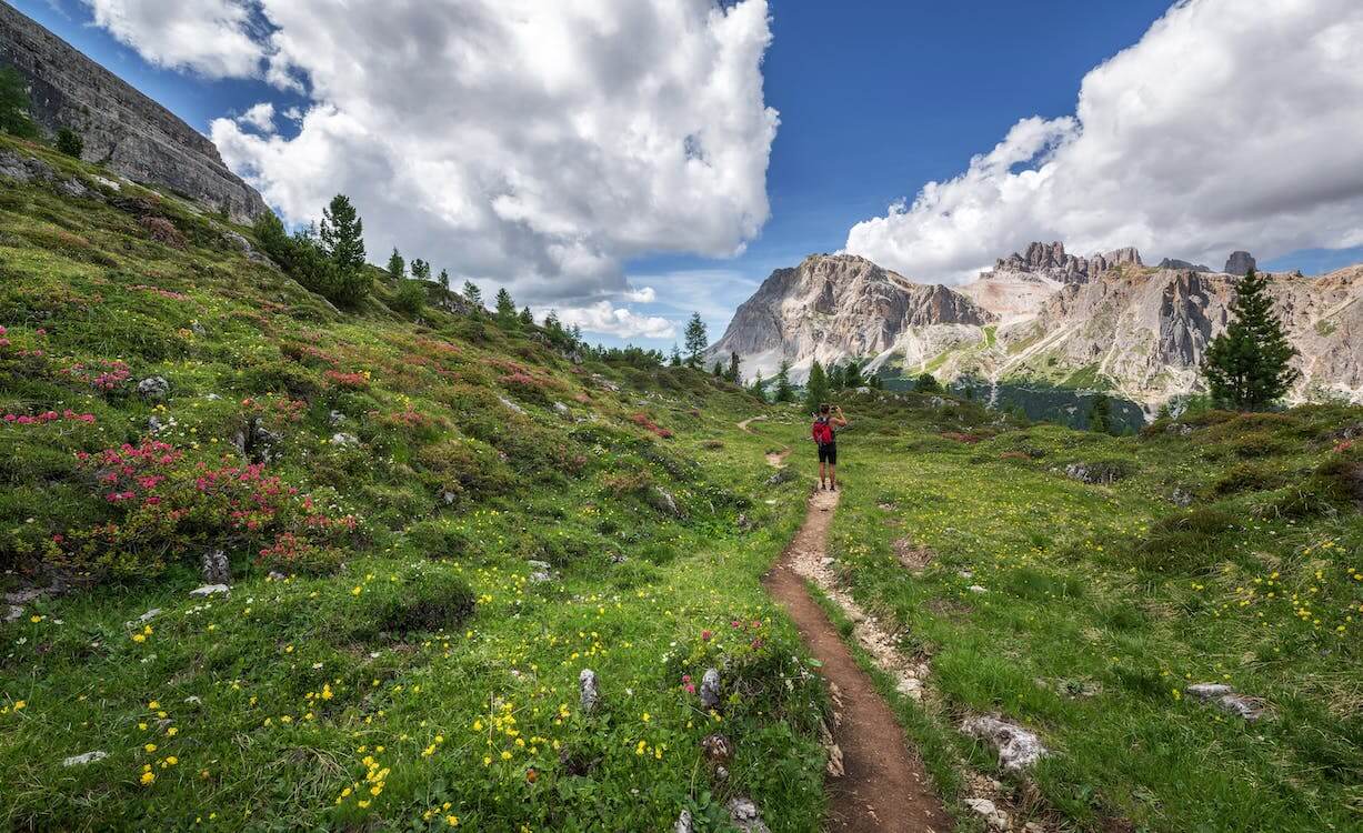 Free Person Waking on Hill Stock Photo